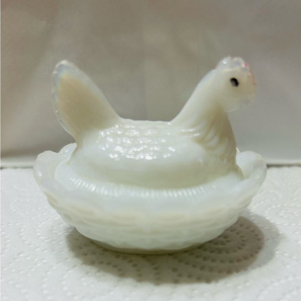 Vintage depression glass mini hen on nest. White with red comb, black eyes.